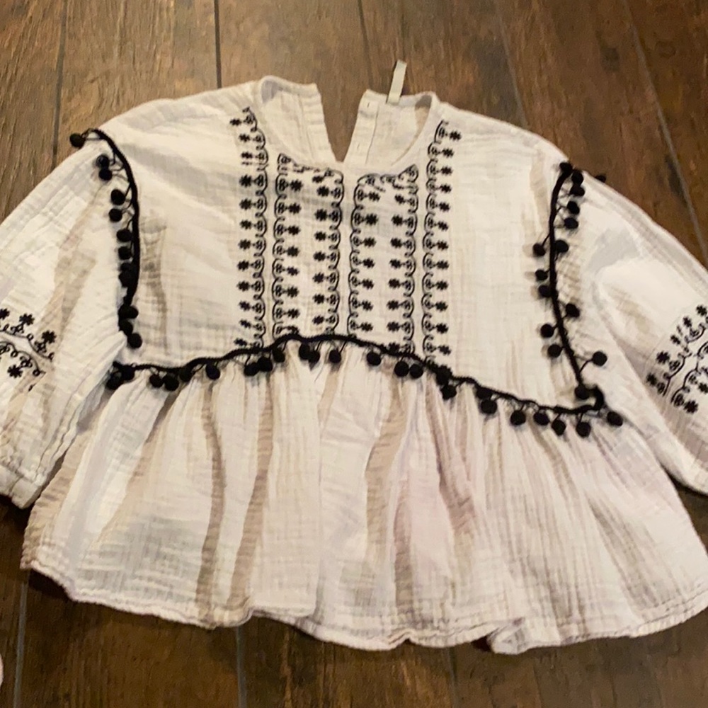 shirt w pom poms